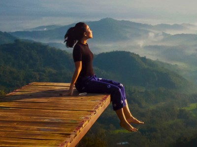 A women surrounded by the serene peace of nature