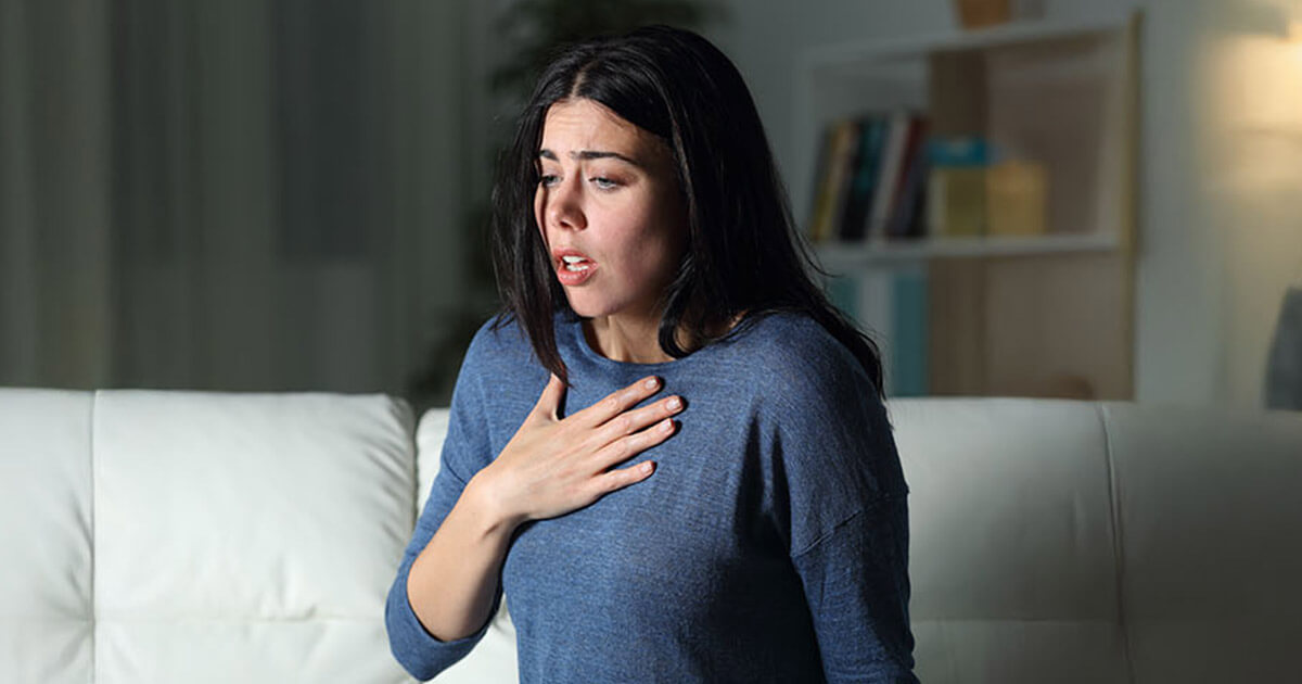 Woman suffering an anxiety attack 