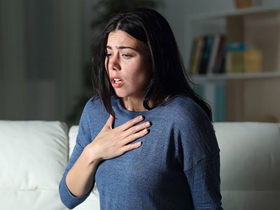Woman suffering an anxiety attack
