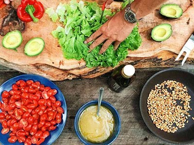 Preparing a salad outdoors